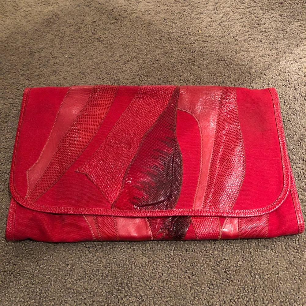 Large Carlos Falchi snakeskin clutch